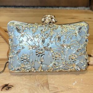 Silver Leather Clutch With Gold And Crystal Floral Embellishments